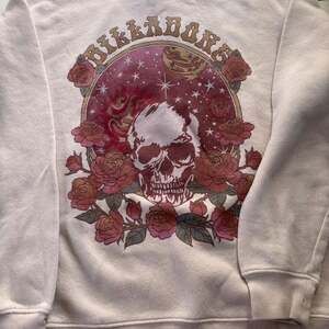 Billabong Women's Ivory Skull and Roses Graphic Crewneck Sweatshirt